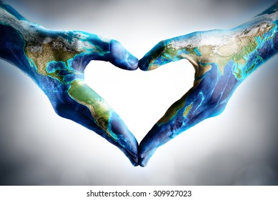 earth's day celebration - hands shaped heart with world map - elements of this image furnished by NASA
 - Shutterstock ID 309927023