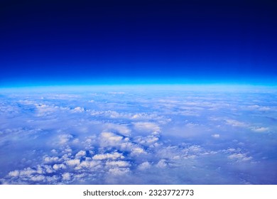 Earth's stratosphere and sunlit sea of clouds