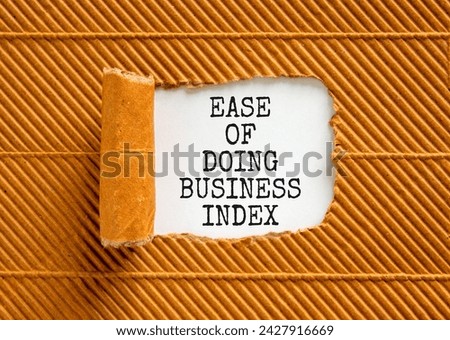Ease of doing business index symbol. Concept words Ease of doing business index on beautiful white paper. Beautiful brown paper background. Business, ease of doing business index concept. Copy space.