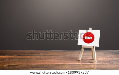 Easel with no entry symbol. Prohibition of actions and operations, restricted area. Ban and sanctions. Isolation zone and quarantine. Wrong direction. Failed strategy. Inaccessibility, taboo.