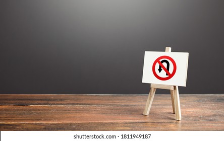 Easel with no turning back traffic sign. Go to the goal, don't stop. Assertiveness and striving, moving forward without retreating. Finish things. There is no way back. Obstinacy and irrevocability - Shutterstock ID 1811949187