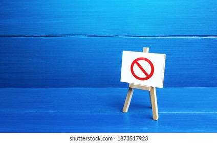 Easel with the prohibition sign NO. Restricted area. Absence. Restrictions and sanctions. Inaccessibility. Ban and Embargo. Failed strategy. Denying entry, stopping action processes. Limitations. - Shutterstock ID 1873517923