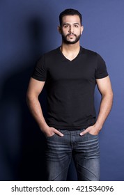 East Asian Handsome Man Wearing Black Tshirt And Jeans 