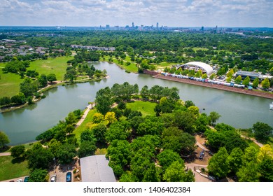 East Austin Mueller Pond over the new development of East side of the capital cities farmers market and green space public park aerial drone view Austin , Texas , USA