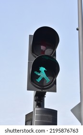 East Berlin stoplight man in green - Shutterstock ID 2195876763
