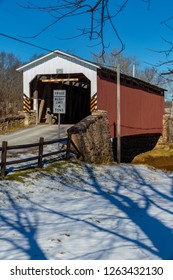 East Earl, PA, USA - January 28, 2015: Weaver’s Mill Covered Bridge spans the Conestoga River in eastern Lancaster County, PA