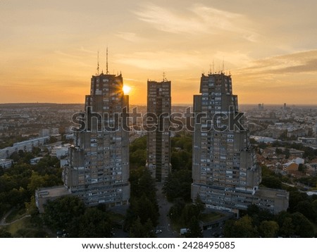 East gate of Belgrade, Silhouette of Brutalist Condominium complex at sunset. Aerial of unique Architecture in Serbia