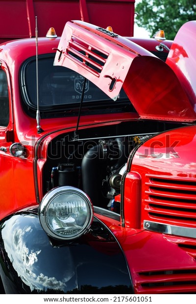 East\
Gwillimbury, Ontario, Canada - May 28, 2022: Vintage retro red\
Dodge car with open hood and exposed\
engine