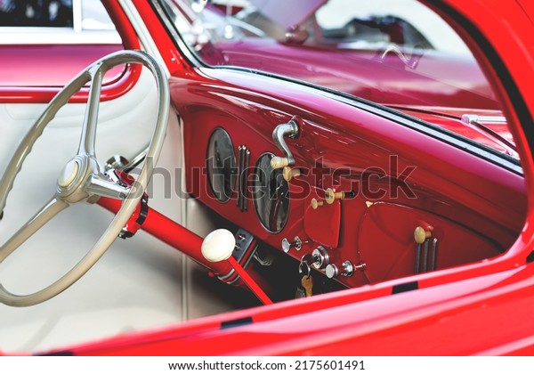 East\
Gwillimbury, Ontario, Canada - May 28, 2022: Closeup inside view of\
the old vintage retro red Plymouth car\
da