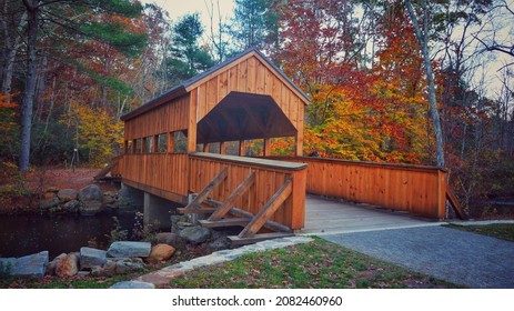 East Haddam, Connecticut - October 2021: Covered Bridge Surrounded By Autumn Foliage