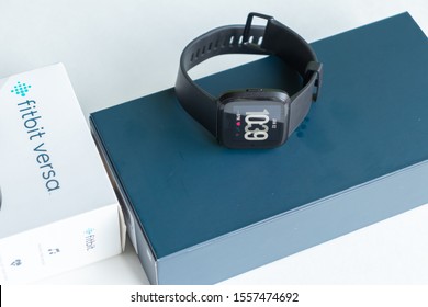 East Hartford, Connecticut, USA – January 2, 2019: close up of black Fitbit versa on the original box, Fitbit was recently acquired by Google’s parent company Alphabet