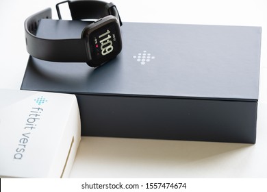 East Hartford, Connecticut, USA – November 3, 2019: close up of black Fitbit versa on the original box, Fitbit was recently acquired by Google’s parent company Alphabet