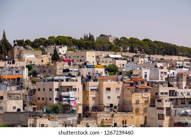 East Jerusalem, West Bank, Palestine / Israel - June 16, 2018: Generic Architectural View Of Silwan, Arab Village On The Mount Of Olives Across The Old City Walls Of Jerusalem.