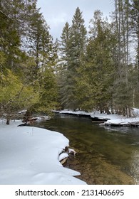 East Jordan River in Northern Michigan snow covered winter
