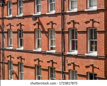 East London, England UK. Traditional Red Brick Housing And Flats. Sash Windows And Slate Roof. Concept For Buying, Renting, Estate Agent, Urban Housing And Living In The City.