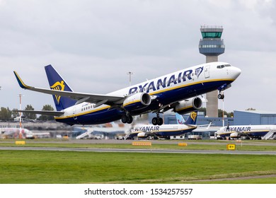 East Midlands Airport (EMA), England, 17th October 2019, Ryanair passenger aircraft EI-DWZ a Boeing 737 – 8AS takes off from the airport with other aircraft in the background.  
