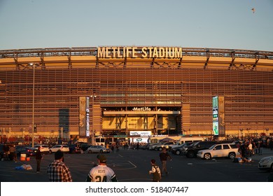 East Rutherford, New Jersey - November 2016: Metlife Stadium at sunset golden hour before New York Jets football game as fans tailgate before enter arena