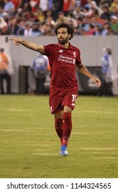 EAST RUTHERFORD, NJ - JULY 25, 2018: Mohammed Salah #11of Liverpool FC in action against Manchester City during 2018 International Champions Cup game at MetLife stadium. 