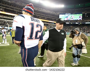 EAST RUTHERFORD, NJ - NOV 22: New York Jets head coach Rex Ryan and New England Patriots quarterback Tom Brady (12) shake hands after the game at MetLife Stadium on November 22, 2012.
