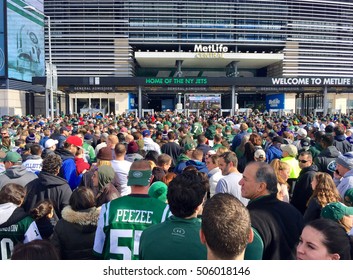 East Rutherford, NJ - October 2016: New York Jets Fans Crowd Into Entrance Of Metlife Stadium To Cheer Football Team Against Balitmore Ravens Opponent On Sunday Gameday