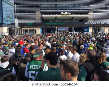 East Rutherford, NJ - October 2016: New York Jets Fans Crowd Into Entrance Of Metlife Stadium To Cheer Football Team Against Balitmore Ravens Opponent On Sunday Gameday