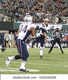 EAST RUTHERFORD, NJ-NOV 22: New England Patriots quarterback Tom Brady (12) throws a pass to running back Shane Vereen (34) against the New York Jets at MetLife Stadium on November 22, 2012.