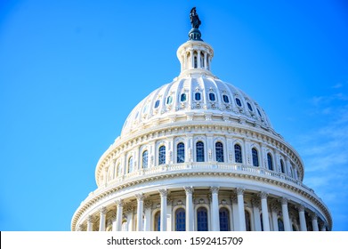 East Side Of The US Capital Dome With Blue Sky Background