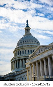 East Side Of The US Capital Dome With Blue Sky Background