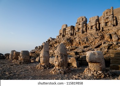 East terrace of Mount Nemrut at sunrise with the head in front of the statues.  The UNESCO World Heritage Site at Mount Nemrut where King Antiochus of Commagene is reputedly entombed.