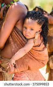 EAST OF WINDHOEK, NAMIBIA - JAN 3, 2016: Unidentified bushmen Little girl. Bushmen people are members of various indigenous hunter-gatherer people of Southern Africa