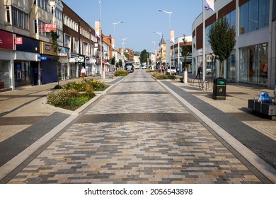 Eastbourne, East Sussex, United Kingdom - August 16 2021: An empty Terminus Road. Shops to the left and Beacon Centre to the right.