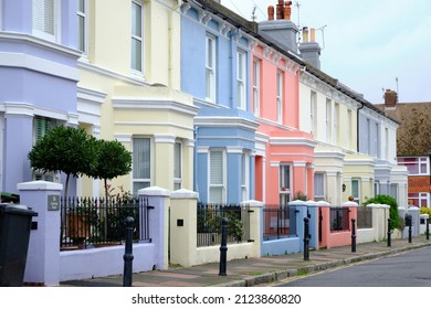 Eastbourne, United Kingdom - 26 October 2021: English Street With Colourful Vintage Terraced Houses. Diminishing Perspective.