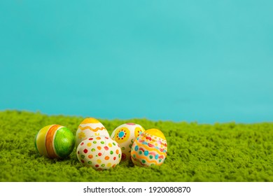 Easter background with cracked eggs green grass blue sky - Powered by Shutterstock