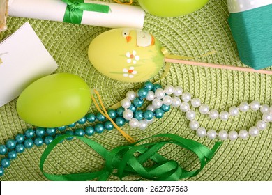 Easter background with eggs, ribbons and spring decoration