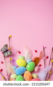 Easter Background With Easter Eggs And Spring Flowers On A Pink Background. Flat Lay, Top View. Vertical Format