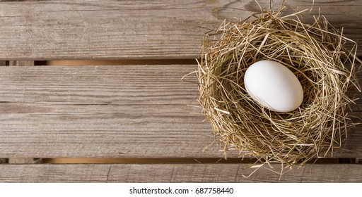 Easter background with Easter eggs. Top view with copy space.