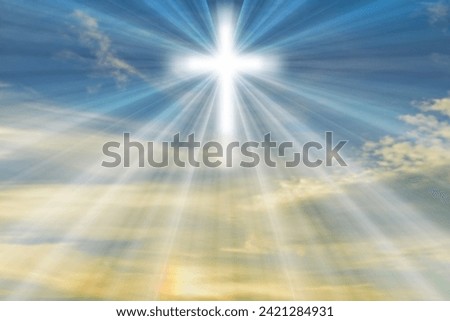 Easter background with a shining cross on blue sky with clouds and lightbeam.