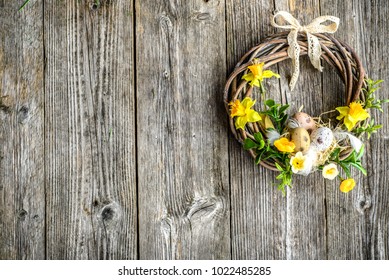 Easter Background With Spring Easter Eggs And Flowers, Wreath On Door