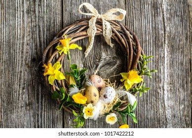 Easter Background With Spring Wreath Hanging On Door