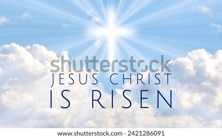 Easter background with the text 'Jesus Christ is Risen' and a shining cross on blue sky with lightbeam.