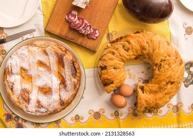 Easter breakfast in Italy whit Colomba cake chocholat egg corallina salami Casatiello cake from Naples and Pastiera cake from campania Region