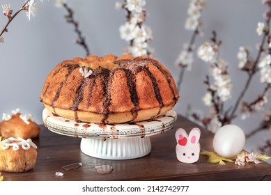 Easter Cake With Cherry Flower Branches On A White Background, Close Up, Still Life Food Photography