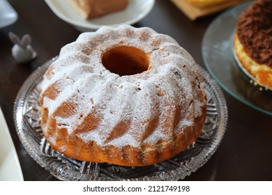 Easter Cakes Table In Poland. Easter Pastry: Babka Cake. Easter In Poland - Wielkanoc.