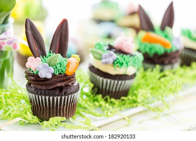 Easter Chocolate Cupcakes Decorated With Piggy And Bunny Ears.