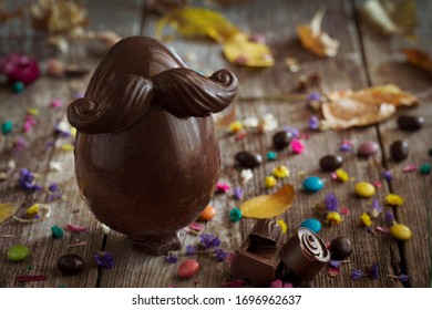 Easter Chocolate Egg With Moustache And Candy