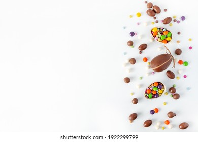 Easter. Chocolate Eggs And Color Candy On The White Background