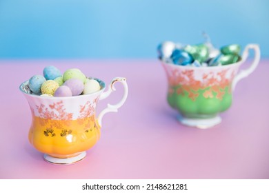 easter chocolate pastel pink blue teacup yellow green - Powered by Shutterstock
