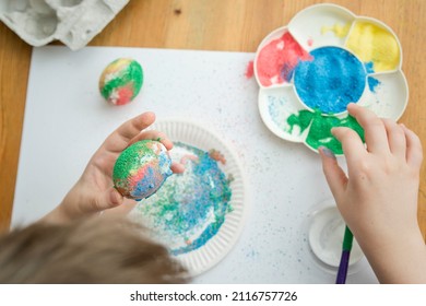 Easter. A Christian Religious Holiday. Egg Mottle With Different Color Salt. Tradition To Variegate With Various Colors And Various Techniques. Global Spring Fest.