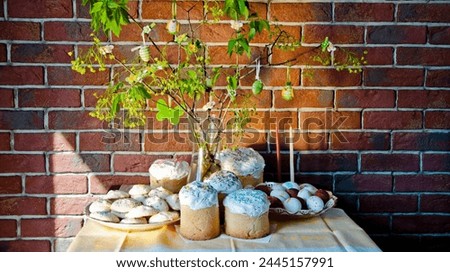 Easter composition on brick wall background. Happy Easter holiday celebration at home. Easter bunny hunt. Spring holiday at Sunday. Eastertide and Eastertime. Good Friday. Hunting eggs.