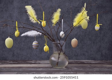 Easter composition, Easter tree decorated with eggs and feathers.